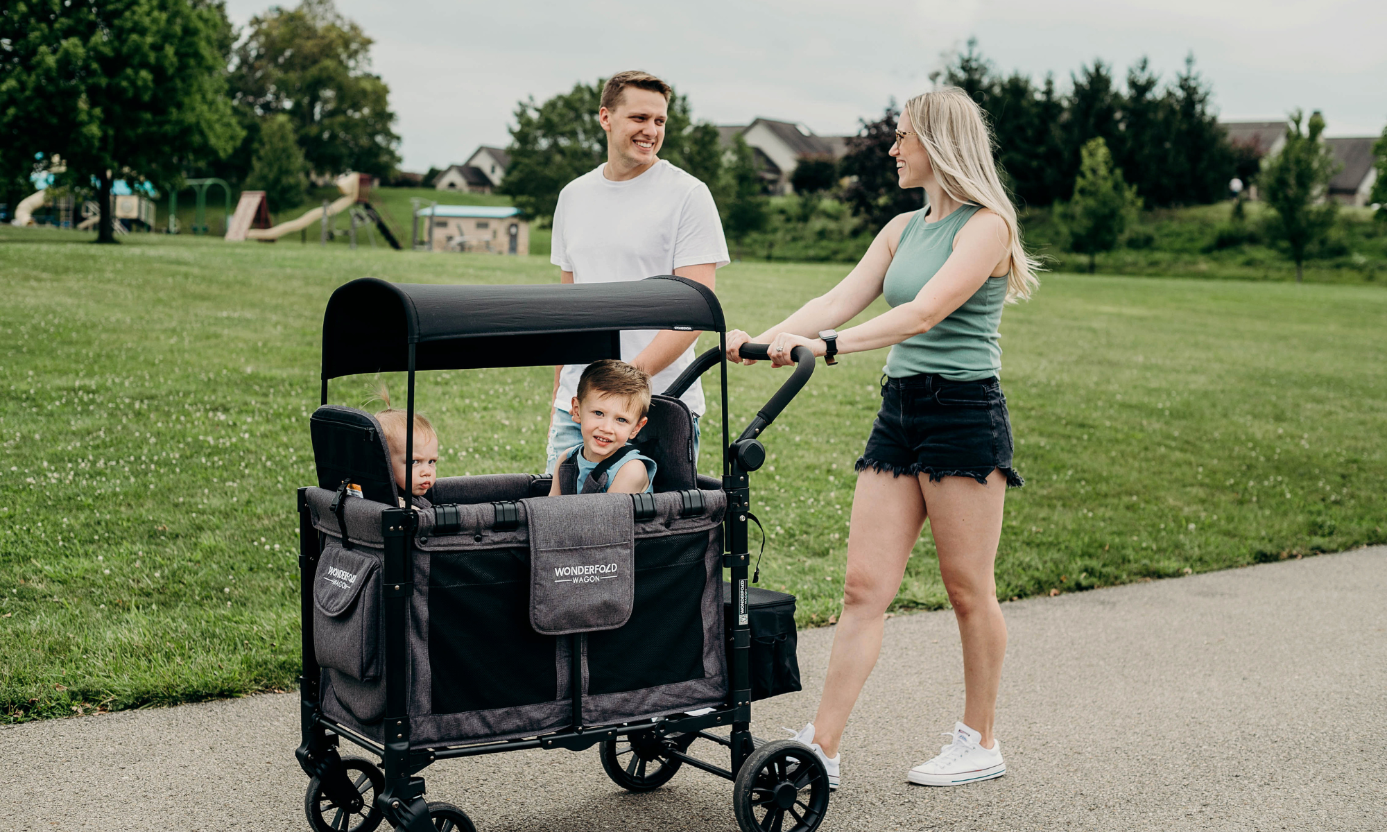 WonderFold stroller wagon used with two children outdoors in Australia